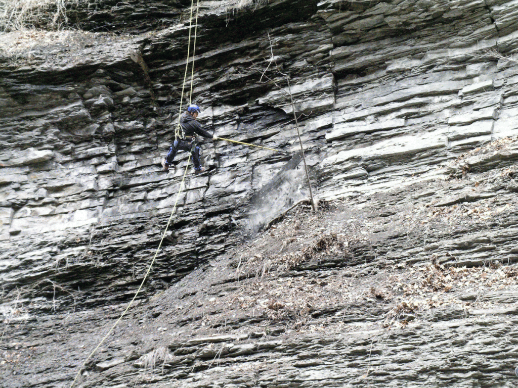 Watkins Glen Scaling Scaler removes rock in the Main Entrance at Watkins Glen State Park, Finger Lakes