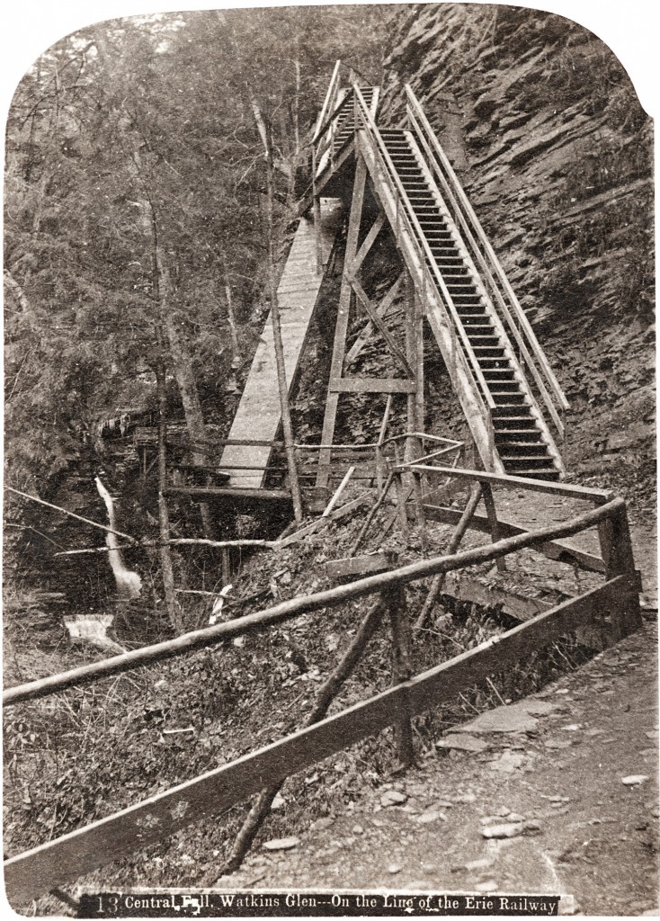 19th century photograph of a wooden staircase climbing to Central Cascade in Watkins Glen.
